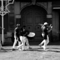 A lively street band marching in Giugliano, showcasing Italian culture and music.