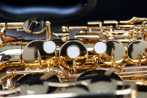 Detailed view of saxophone keys and mechanisms, highlighting craftsmanship in São Paulo, Brazil.